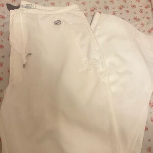 vinyage nike white track pants with drawstrings + zip up wide/mini flare bottom